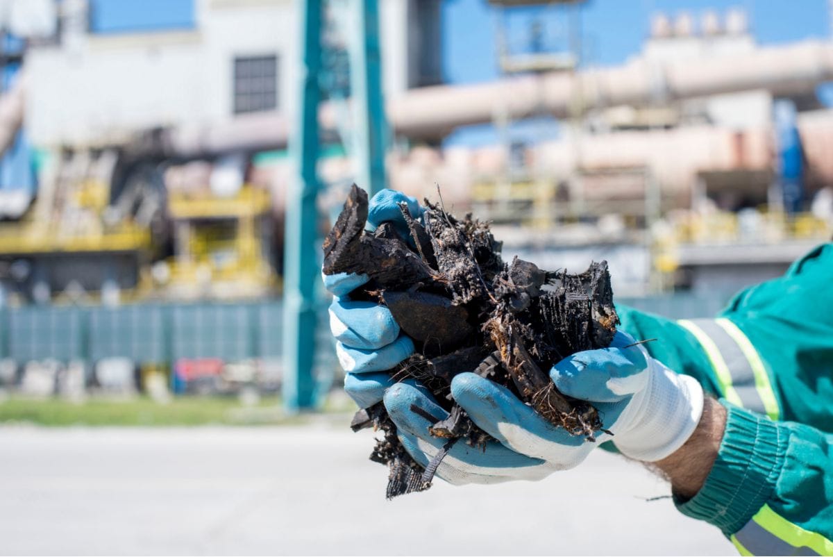 person holder shredded rubber from tires